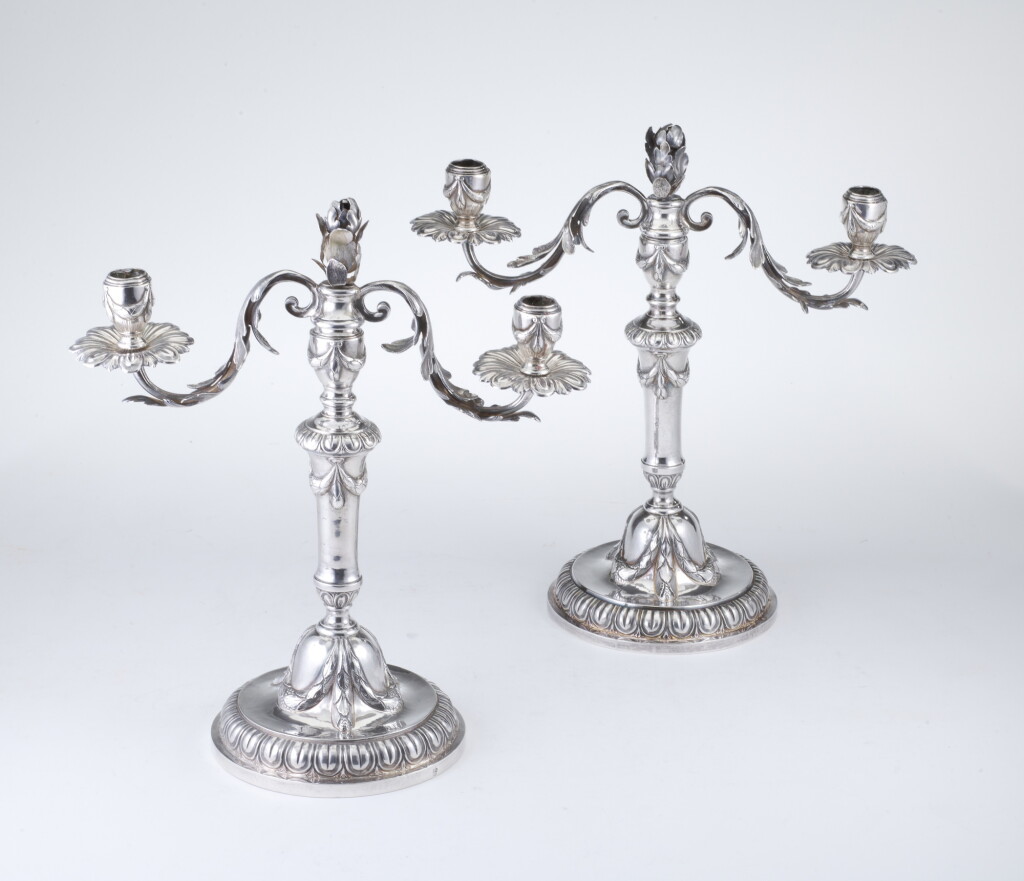 View full screen - View 1 of Lot 32. A pair of Italian silver two-light candelabra, Genoa, probably 1785 .