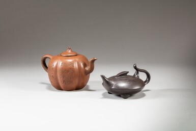 View full screen - View 1 of Lot 52. A clay teapot and covers, Qing dynasty, Guangxu period, dated Renyin year, corresponding to 1902 and a clay teapot and covers, Republican period | 清光緒壬寅年(1902年)欽州窯茶壺《欽州黎家造》款 及 民國 紫砂壺《范錫耑制》款 一組兩件.