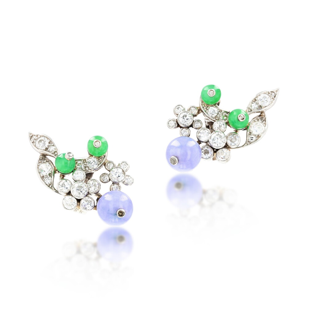 View full screen - View 1 of Lot 178. Paire de clips d'oreille jadéite et diamants | Pair of jadeite and diamond ear clips.