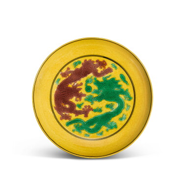 View full screen - View 1 of Lot 365. A yellow-ground green-and-aubergine-enamelled 'dragon' dish, Mark and period of Guangxu 清光緒 黃地紫綠彩葡萄雲龍紋盤 《大清光緒年製》款.