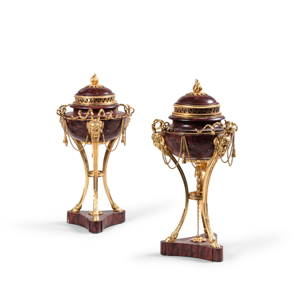 View full screen - View 1 of Lot 432. A pair of Louis XVI gilt-bronze mounted red griotte incense burners, circa 1785.