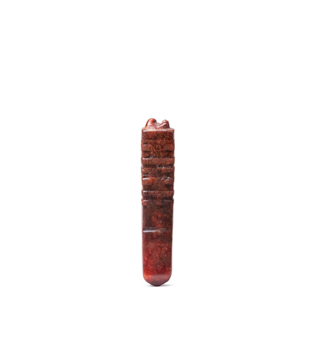 View full screen - View 1 of Lot 180. A reddish-brown jade pendant, Neolithic period | 新石器時代 玉珮飾.