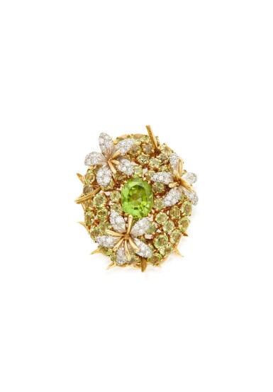 View full screen - View 1 of Lot 9. PERIDOT AND DIAMOND 'COUSSIN' CLIP-BROOCH, SCHLUMBERGER FOR TIFFANY & CO. .