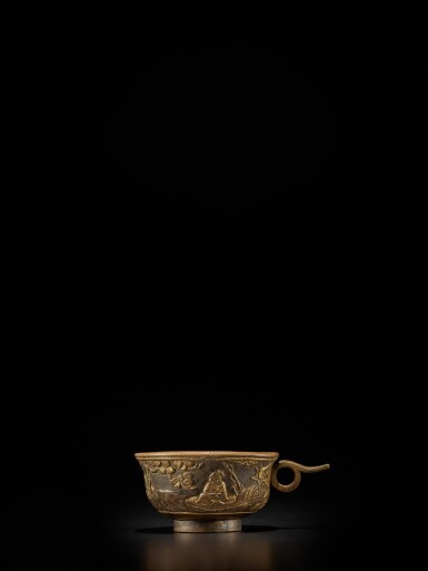 View full screen - View 1 of Lot 124. A small parcel-gilt-bronze cup, Ming dynasty, Wanli period, dated renzi year, corresponding to 1612 | 明萬曆壬子年(1612年) 銅局部鎏金松下高士圖小盃 《萬曆壬子》款.