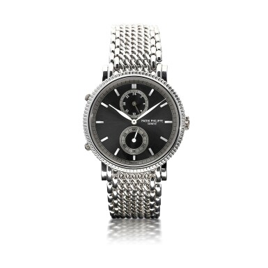 View full screen - View 1 of Lot 77. PATEK PHILIPPE | REFERENCE 5034G TRAVEL TIME A WHITE GOLD DUAL TIME WRISTWATCH WITH 24-HOUR INDICATION, CIRCA 2000.