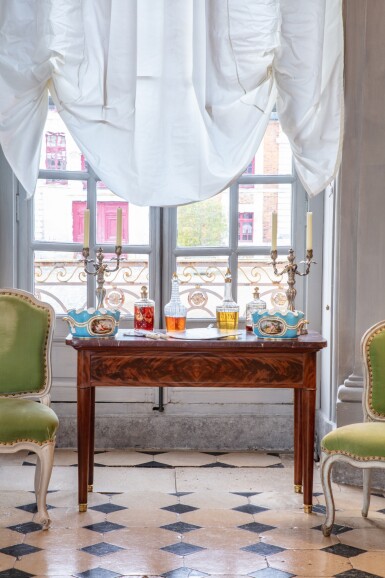 View full screen - View 1 of Lot 31. A Louis XVI plum pudding mahogany veneer royal table, stamped Jacques Bircklé, circa 1780 | Table royale en placage d’acajou flammé d’époque Louis XVI, estampille de Jacques Bircklé, vers 1780.