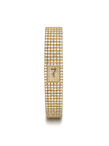 View full screen - View 1 of Lot 44. PIAGET | POLO REF 15201 C 62 6 A LADY'S YELLOW GOLD AND DIAMOND SET BRACELET WATCH CIRCA 1990.