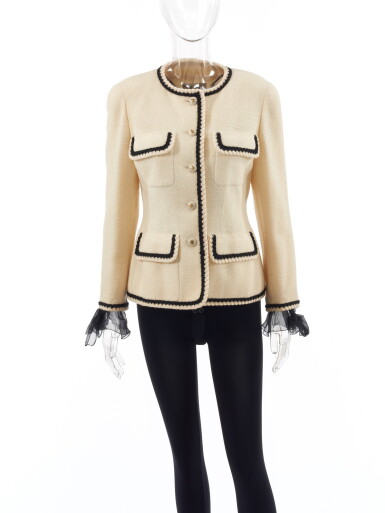 View full screen - View 1 of Lot 16. CHANEL | WOOL AND SILK JACKET AND BLOUSE .
