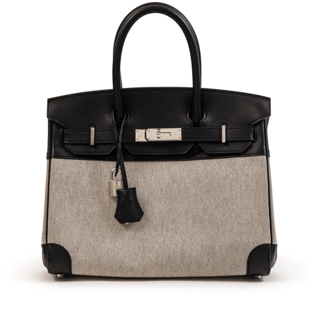 View full screen - View 1 of Lot 676. Limited Edition Black Swift, Ecru and Ardoise Toile Birkin 30 Palladium Hardware, 2023.