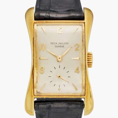 View full screen - View 1 of Lot 87. Reference 2442 'Marilyn Monroe' | Retailed by Serpico y Laino: A yellow gold rectangular wristwatch, Circa 1949.