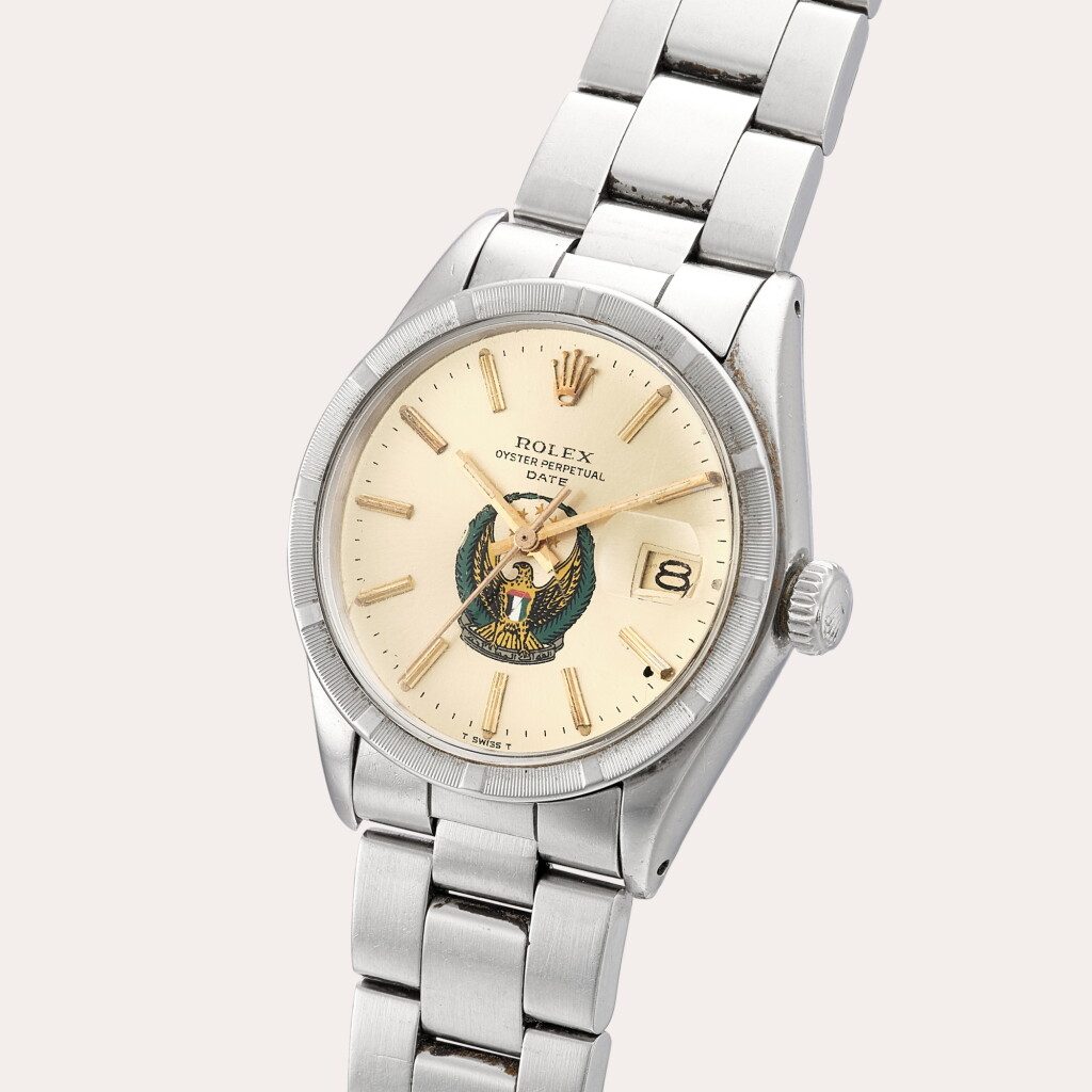 View full screen - View 1 of Lot 346. Oyster Perpetual Date, Reference 1501 | A stainless steel wristwatch with UAE Coat of Arms dial, date and bracelet | Circa 1972.
