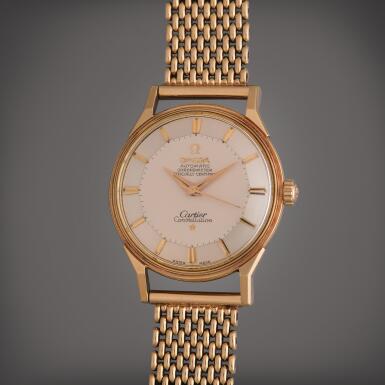 View full screen - View 1 of Lot 43. Reference 14900 SC Constellation 'Pie Pan' | Retailed by Cartier: A yellow gold automatic wristwatch with bracelet, Circa 1962.