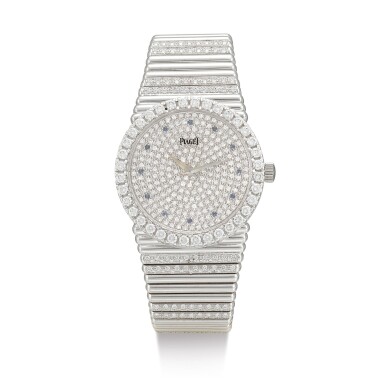 View full screen - View 1 of Lot 103. PIAGET | EMPERADOR, REFERENCE 12336C, A HEAVY WHITE GOLD, DIAMOND AND SAPPHIRE-SET BRACELET WATCH, CIRCA 1980.