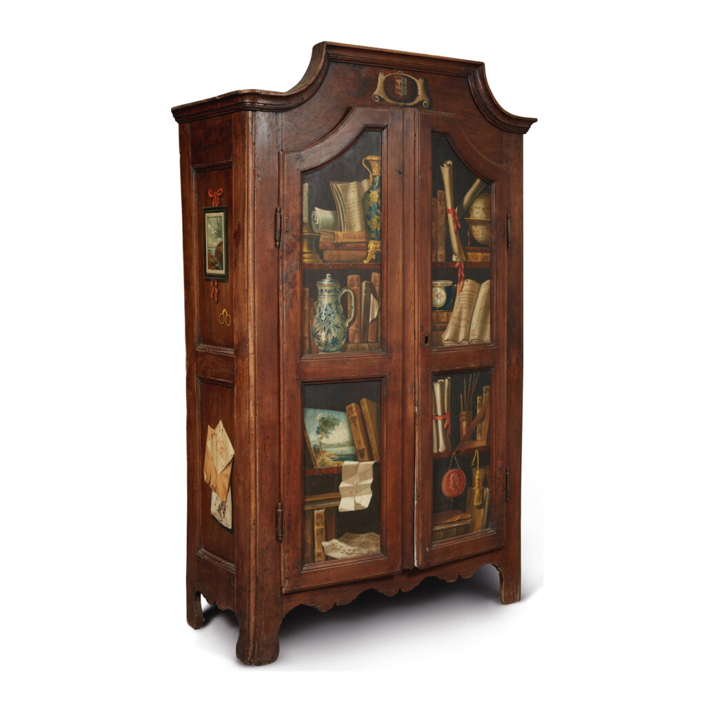 View full screen - View 1 of Lot 516. AN ITALIAN WALNUT ARMOIRE WITH PAINTED TROMPE L'OEIL PANELS, 18TH CENTURY, THE PAINTED DECORATION LATER.