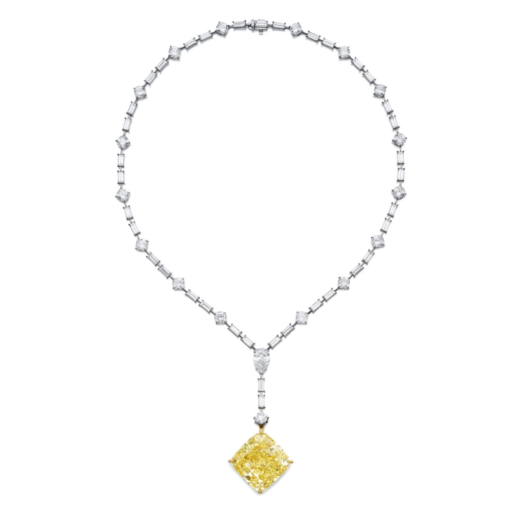 View full screen - View 1 of Lot 38. An Impressive Fancy Vivid Yellow Diamond and Diamond Pendant-Necklace.