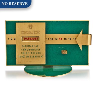 View full screen - View 1 of Lot 8065. ROLEX | DATEJUST A GILT BRASS AND GREEN ENAMEL RETAILER'S WINDOW DISPLAY, CIRCA 1960.