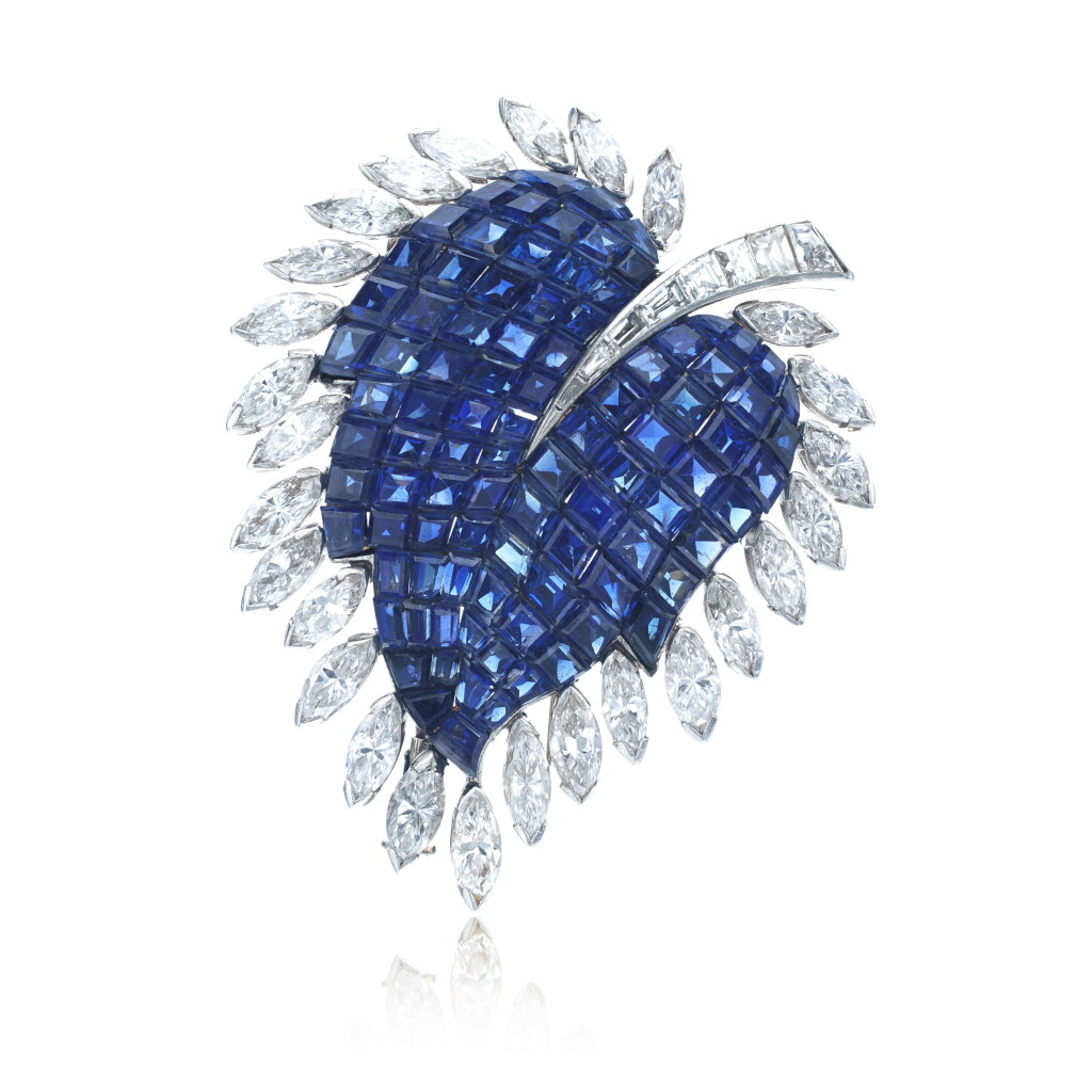 View full screen - View 1 of Lot 587. 'Mystery-set' sapphire and diamond brooch, circa 1960.