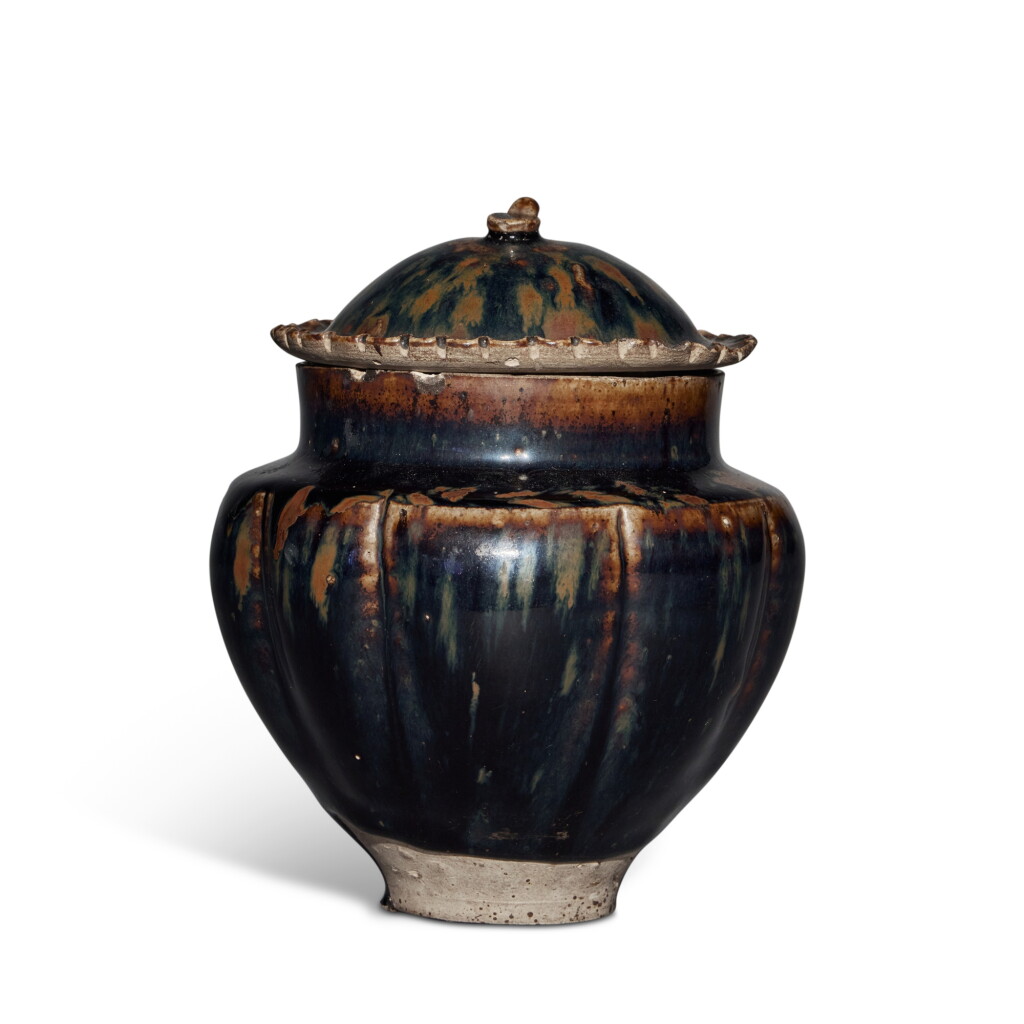 View full screen - View 1 of Lot 211. A black-glazed lobed jar and cover, Northern Song / Jin dynasty.