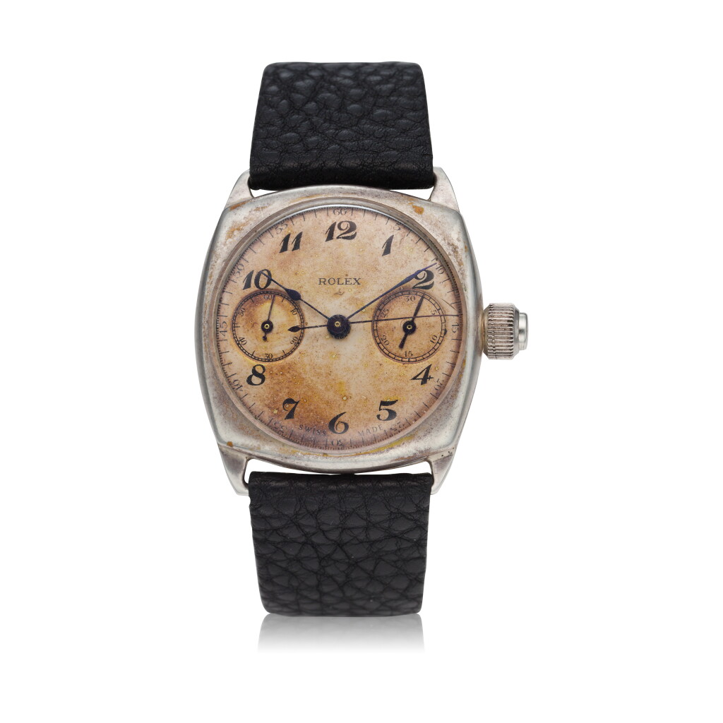 View full screen - View 1 of Lot 272. Reference 2022 A very rare silver cushion shaped single-button chronograph wristwatch, Circa 1935.
