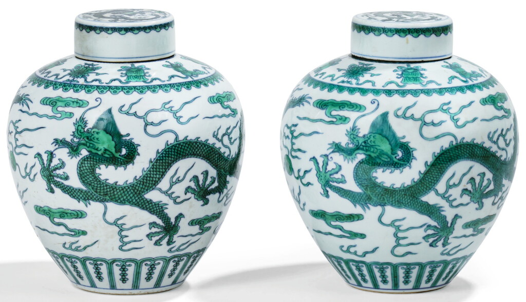 View full screen - View 1 of Lot 13. DEUX JARRES COUVERTES EN PORCELAINE BLEU BLANC ÉMAILLÉE VERT MARQUES ET ÉPOQUE QIANLONG | 清乾隆 青花綠釉龍紋蓋罐兩件 《大清乾隆年製》款 | Two green-enamelled 'dragon' jars and covers, Qianlong seal marks and period .
