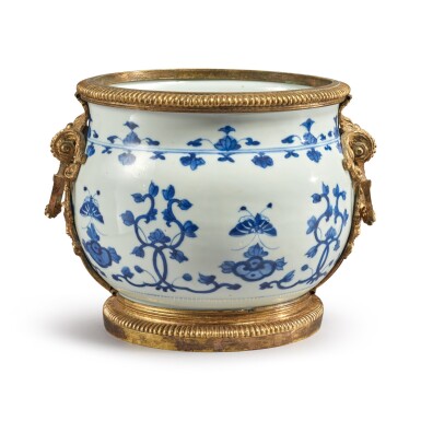 View full screen - View 1 of Lot 410. A Régence Gilt Bronze-Mounted Chinese Porcelain Jardiniere, The Gilt Bronze Early 18th Century, the Porcelain Kangxi, Late 17th/Early 18th Century.