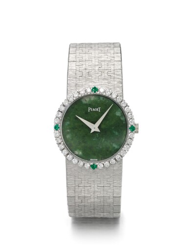 View full screen - View 1 of Lot 60. PIAGET | REF 9706 A 6, A WHITE GOLD, DIAMOND AND EMERALD SET BRACELET WATCH CIRCA 1990.
