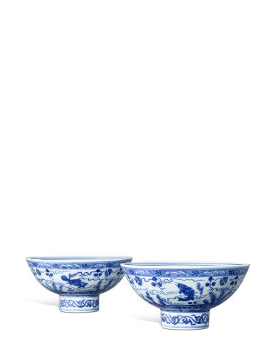 View full screen - View 1 of Lot 821. A very rare pair of blue and white 'fish' bowls, Marks and period of Jiajing | 明嘉靖 青花魚藻紋高足盌一對 《大明嘉靖年製》款.