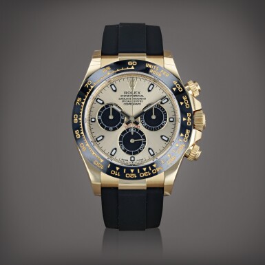 View full screen - View 1 of Lot 615. Daytona 'stickered', reference 116518LN Montre bracelet chronographe en or jaune | Yellow gold chronograph wristwatch with bracelet Vers 2022 | Circa 2022.