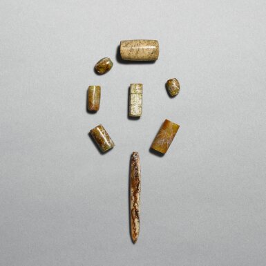 View full screen - View 1 of Lot 714. A group of seven jade beads, a conical pendant, and a cong, Neolithic period, Liangzhu culture | 新石器時代 良渚文化 玉珠、玉琮及玉錐飾一組.