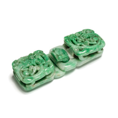 View full screen - View 1 of Lot 744. A jadeite 'chilong' belt buckle, Late Qing dynasty | 清末 翠玉雕螭龍紋帶扣.