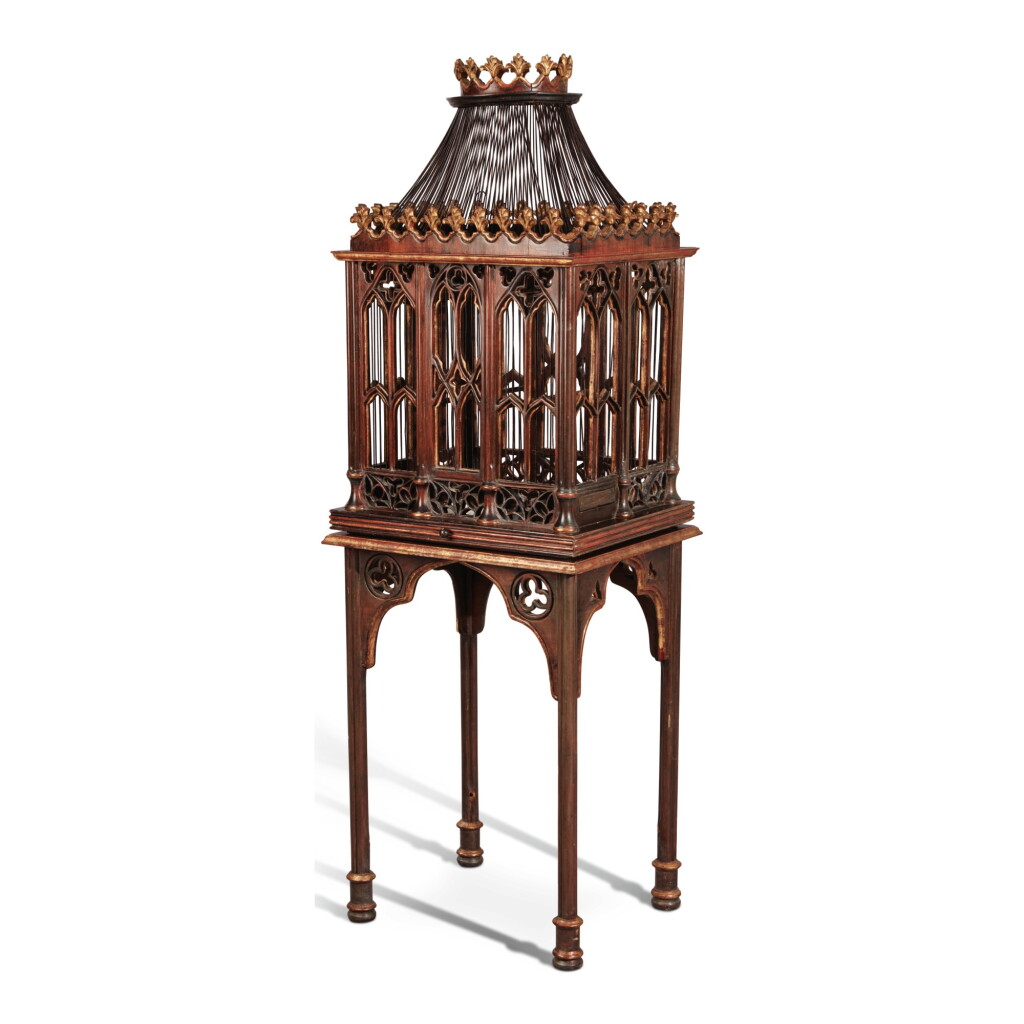 View full screen - View 1 of Lot 749. A VICTORIAN NEO-GOTHIC PARCEL GILT AND GRAINED BIRD CAGE ON STAND, MID-19TH CENTURY.