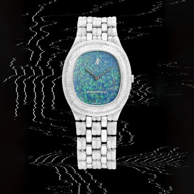 View full screen - View 1 of Lot 25. Reference 56478BC | A white gold bracelet watch with opal dial | Circa 1980.