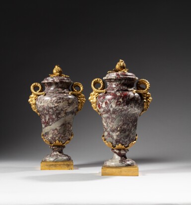 View full screen - View 1 of Lot 332. A pair of Régence gilt-bronze mounted brèche marble vases, circa 1750 | Paire de vases en marbre brèche et monture de bronze doré d’époque Régence, vers 1750.