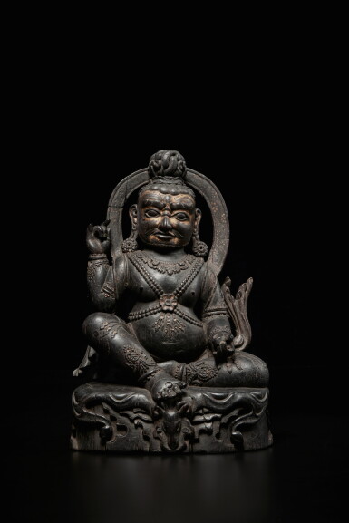 View full screen - View 1 of Lot 328. A large and rare gilt zitan figure of a mahasiddha, Tibet, 17th century.