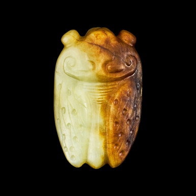 View full screen - View 1 of Lot 136. A celadon and russet jade figure of a cicada Late Ming dynasty | 明末 玉蟬.