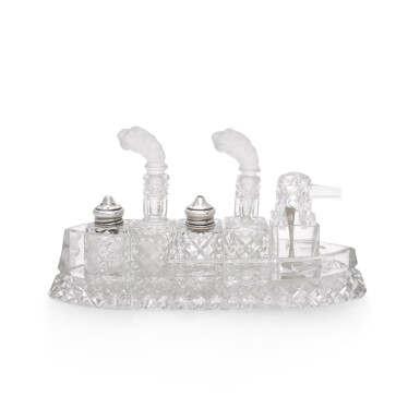 View full screen - View 1 of Lot 61. A rare silver and glass battleship cruet set, maker's mark W&Co., Birmingham 1911.