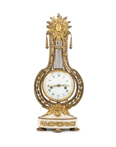 View full screen - View 1 of Lot 16. A gilt-bronze and white marble lyra clock, Louis XVI, circa 1780 | Pendule lyre en bronze doré et marbre blanc d'époque Louis XVI, vers 1780.