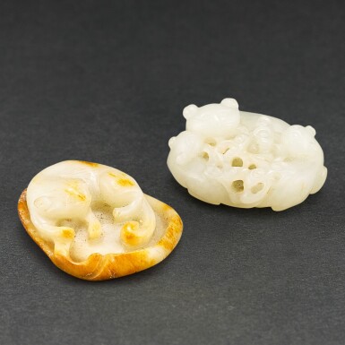 View full screen - View 1 of Lot 592. TWO JADE 'CAT' CARVINGS QING DYNASTY | 清 白玉臥貓一組兩件.
