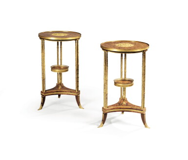 View full screen - View 1 of Lot 189. A pair of gilt-bronze and burr elm guéridons, in the style of Adam Weisweiler.