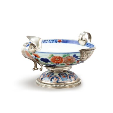 View full screen - View 1 of Lot 842. A French Regence silver-mounted Japanese Imari porcelain double-lipped sauceboat, the porcelain circa 1700, the silver mounts Paris, 1717-1722.