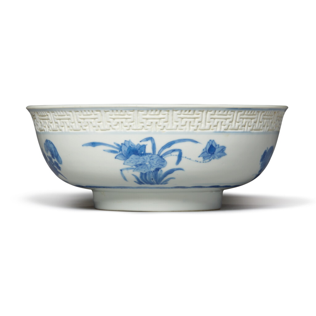 View full screen - View 1 of Lot 832. A MOLDED BLUE AND WHITE BOWL, QING DYNASTY, KANGXI PERIOD.