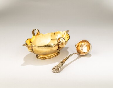View full screen - View 1 of Lot 566. A German silver-gilt sauceboat and sauce spoon from the Mauritzburg treasure: the sauceboat L. Eckert, Germany, 1906; the spoon Johann Bernhard Breymann, Dresden, 1828.
