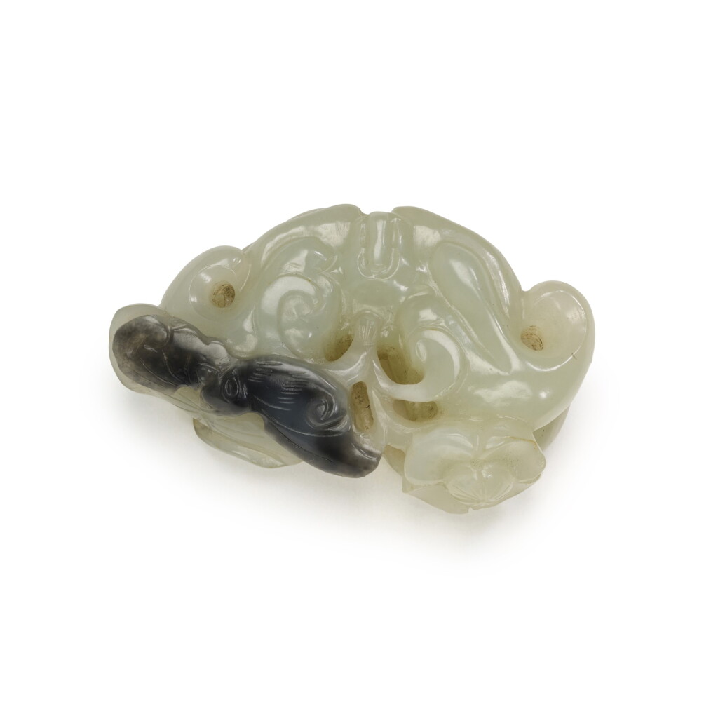 View full screen - View 1 of Lot 238. A PALE CELADON AND GREY JADE 'LOTUS AND BAT' GROUP, QING DYNASTY, 19TH CENTURY | 清十九世紀 灰青玉福至心靈紋把件.