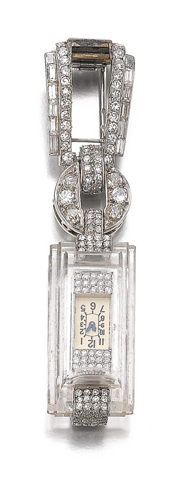 View full screen - View 1 of Lot 546. ROCK CRYSTAL AND DIAMOND LAPEL WATCH, CARTIER, CIRCA 1930.
