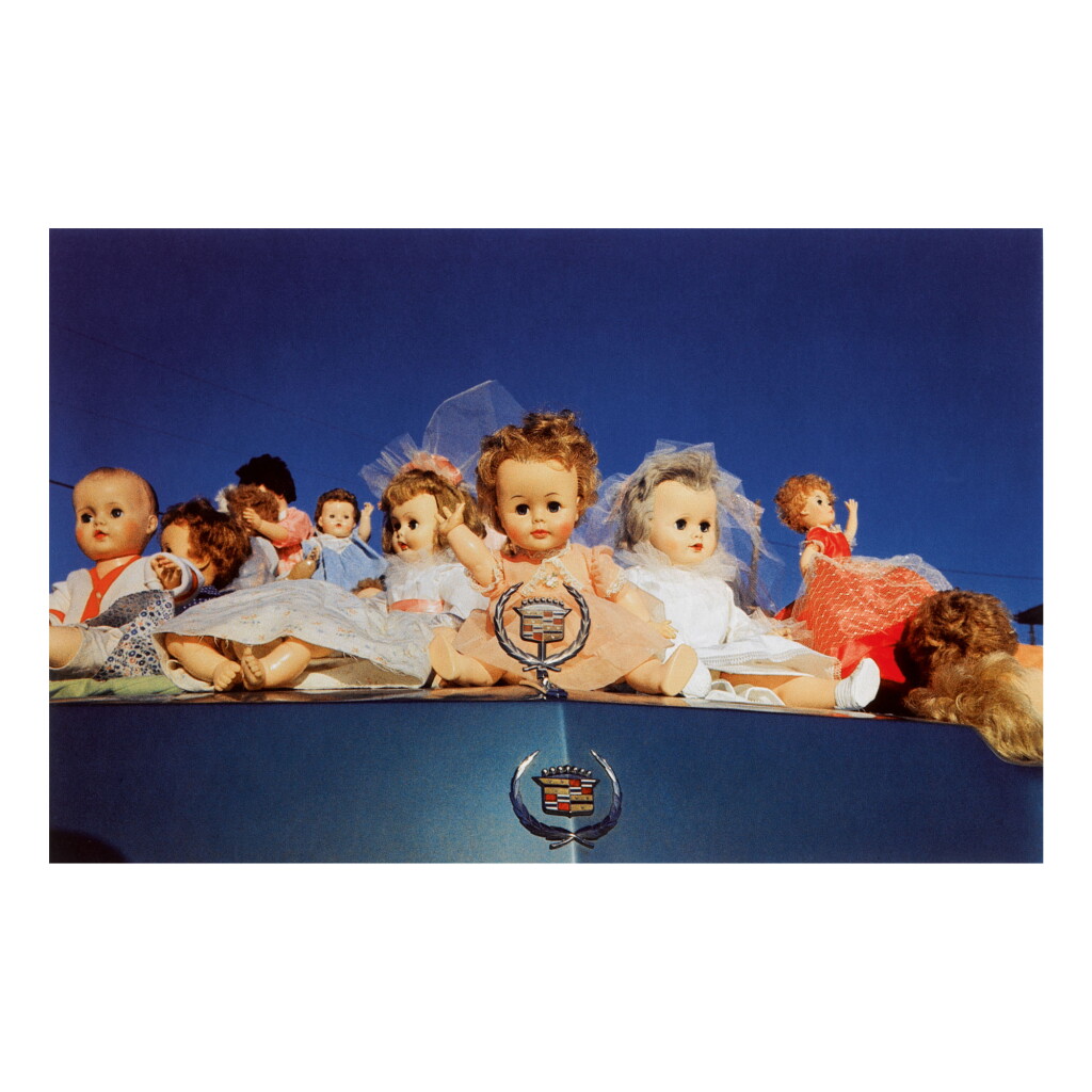 View full screen - View 1 of Lot 93. WILLIAM EGGLESTON | UNTITLED (DOLLS ON CADILLAC, MEMPHIS) .