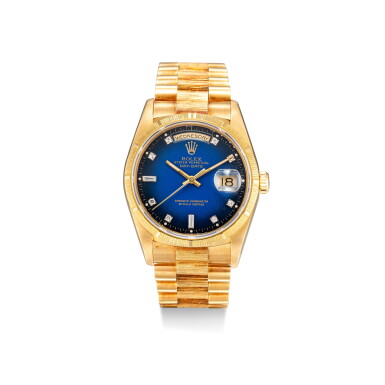 View full screen - View 1 of Lot 103. ROLEX | DAY-DATE, REFERENCE 18248, A YELLOW GOLD AND DIAMOND-SET WRISTWATCH WITH DAY, DATE, BRACELET AND DÉGRADÉ 'STELLA' DIAL, CIRCA 1991.