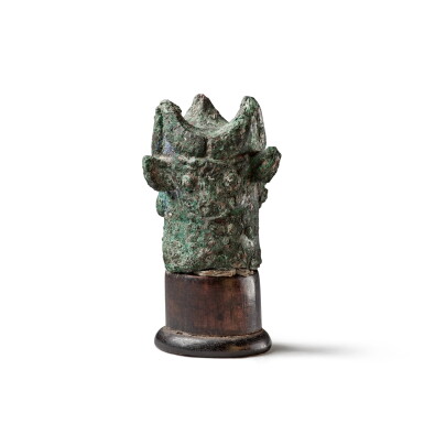 View full screen - View 1 of Lot 43. A small bronze 'mythical beast' pole finial, Shang dynasty | 商 青銅獸面紋杖首.