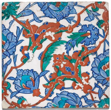 View full screen - View 1 of Lot 276. AN IZNIK POLYCHROME POTTERY TILE WITH INTERLACING SPLIT-PALMETTES AND LOTUS BLOSSOMS, TURKEY, CIRCA 1570.