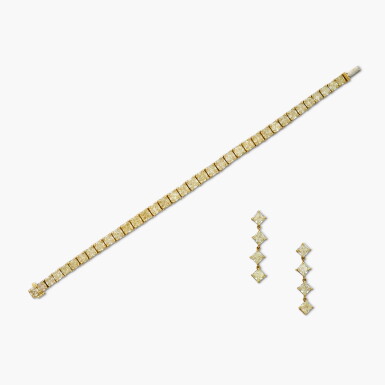 View full screen - View 1 of Lot 412. Colored Diamond Bracelet and Pair of Earrings .