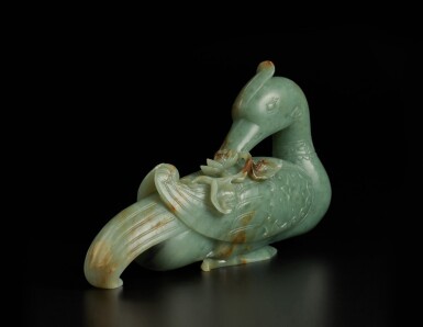 View full screen - View 1 of Lot 208. A large green and russet jade figure of a mandarin duck, Qing dynasty, 19th century | 清十九世紀 青玉雕鴛鴦銜蓮擺件.